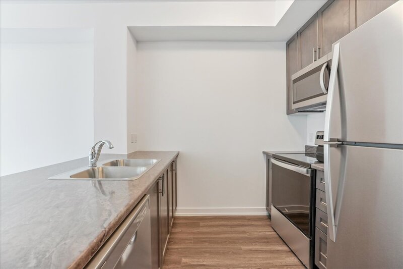 BEAUTIFUL 1 BED + DEN CONDO IN WATERDOWN!