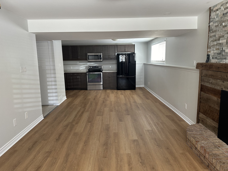 WELL MAINTAINED LOWER LEVEL SUITE ON A QUIET COURT