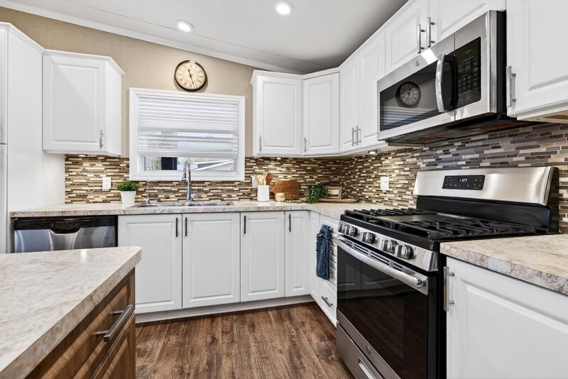 LOW MAINTENANCE LIVING IN THIS GREAT BURLINGTON COMMUNITY!