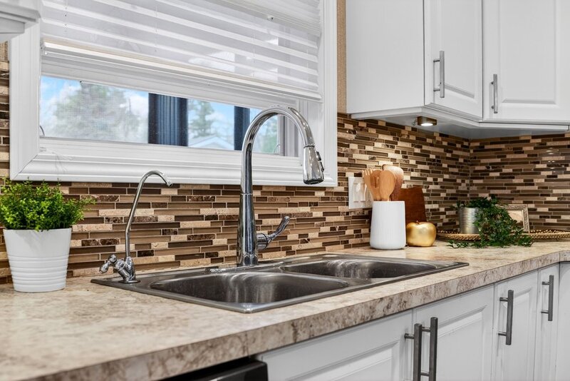 LOW MAINTENANCE LIVING IN THIS GREAT BURLINGTON COMMUNITY!