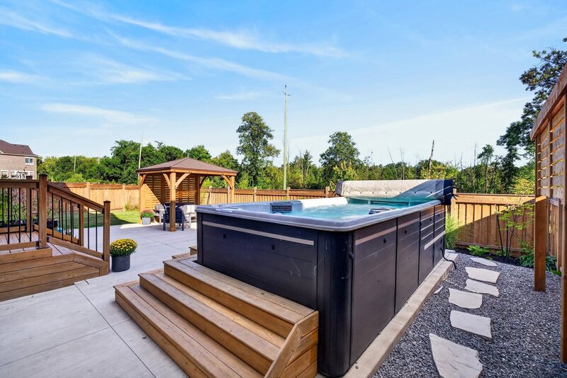 BEAUTIFUL WATERDOWN HOME BACKING ONTO GREENSPACE!