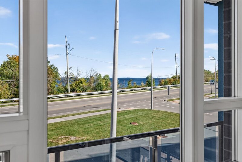 2 UNDERGROUND PARKING SPACES & LAKE VIEWS IN SOUGHT AFTER GRIMSBY NEIGHBOURHOOD