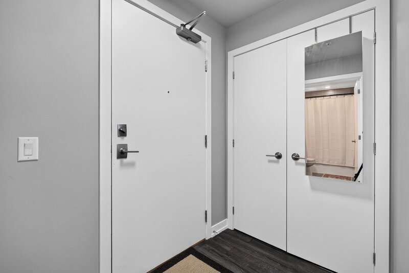 AMAZING VIEWS IN THIS GORGEOUS GRIMSBY 1BR+DEN CONDO